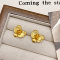 Retro style flower earrings with petal detailing in gold or silver electroplated finish on copper