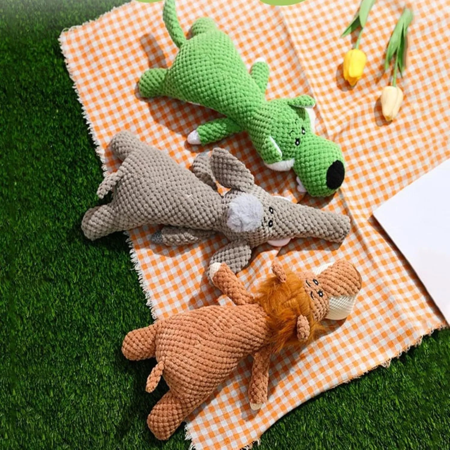 Pet dog plush chewing toy with corn kernel texture and squeaker sound in animal shape