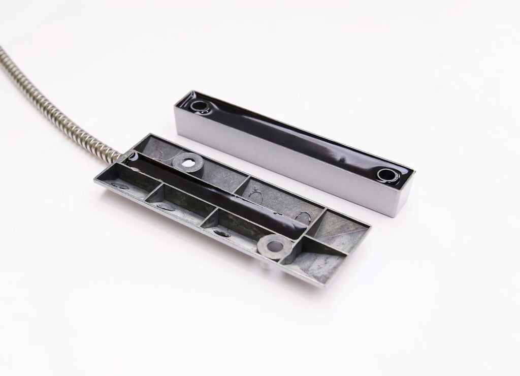 Wireless rolling shutter door magnetic smart detector in silver finish on a white background
