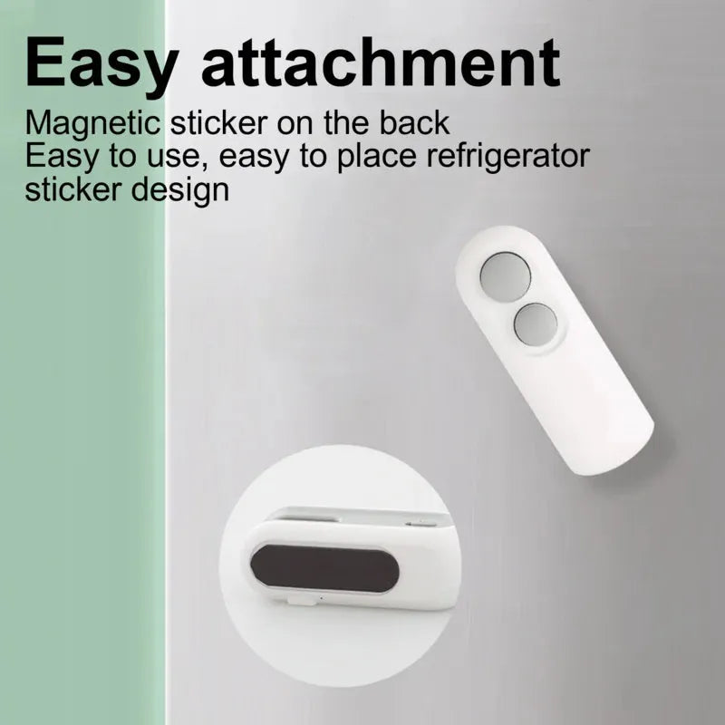 Blue handheld USB rechargeable heat sealer and bag cutter on a kitchen counter.
