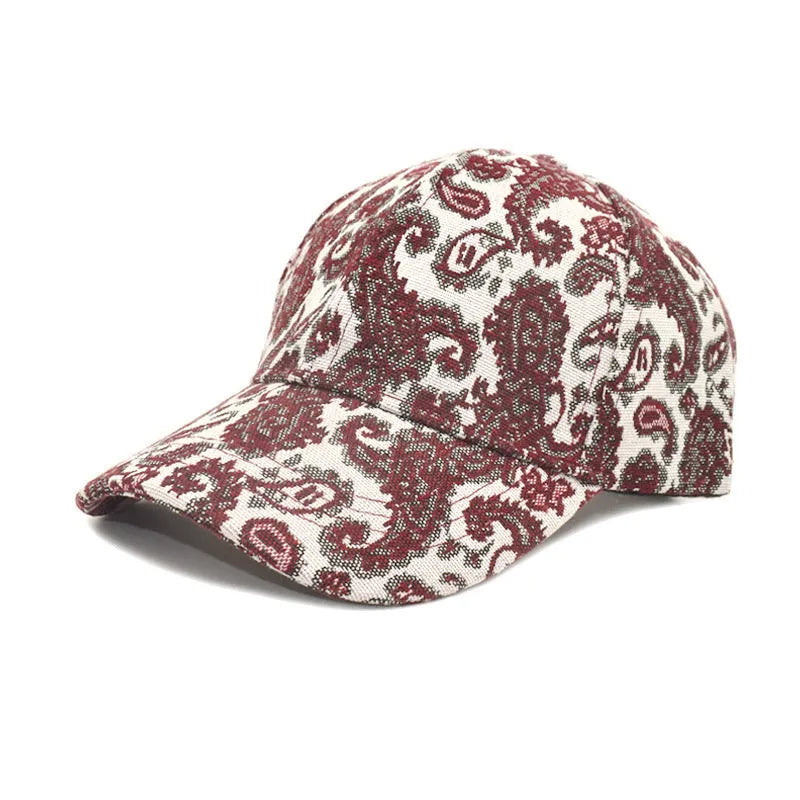 Blue polyester baseball cap with printed paisley pattern showing dome crown design