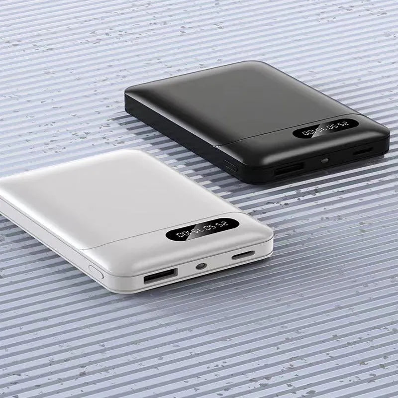 Black and white portable power bank with multiple USB charging ports