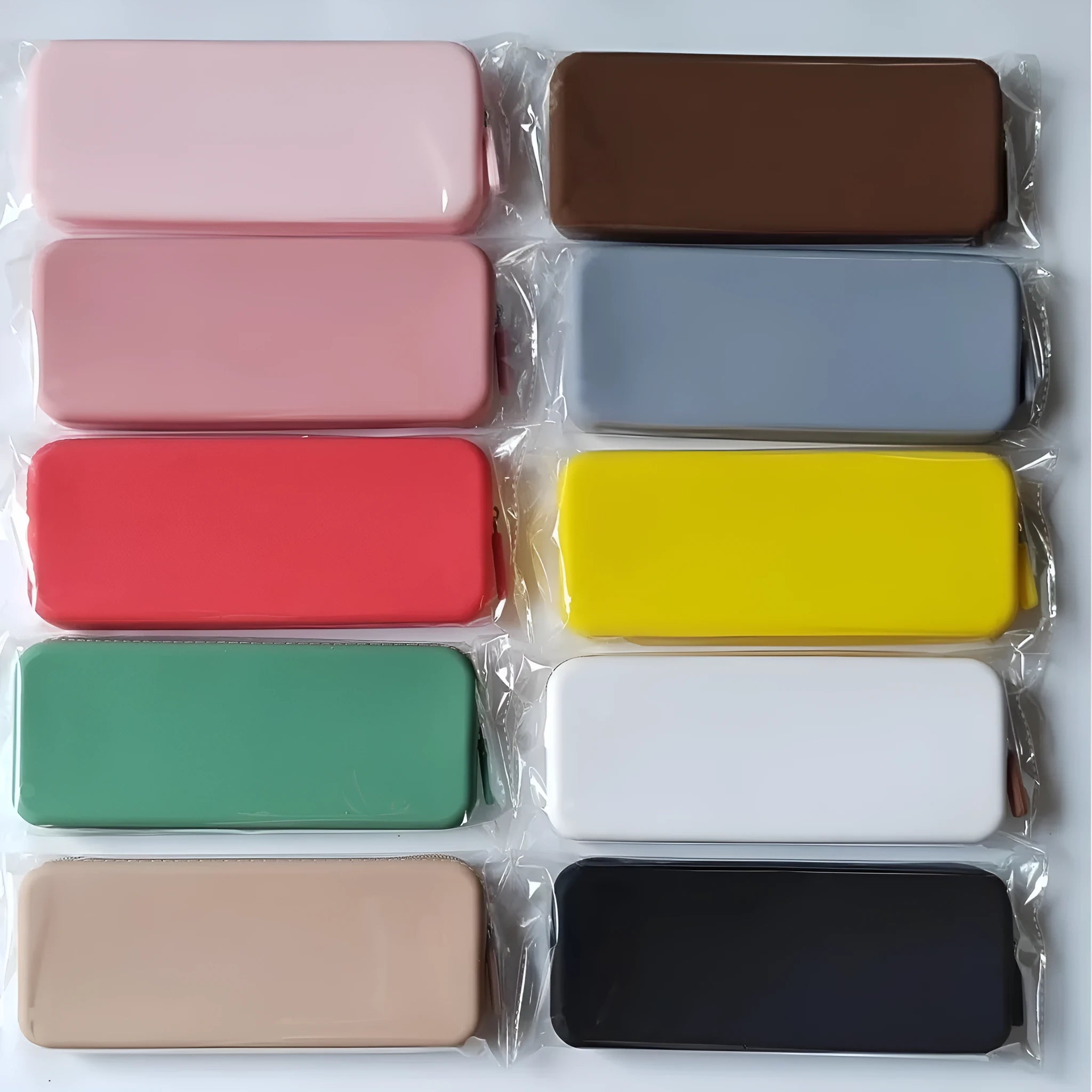 Silicone dustproof travel bag for women's makeup brushes in assorted colours.