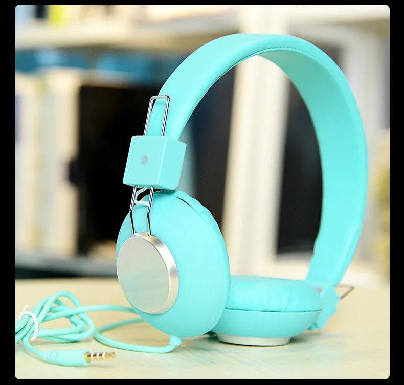 Wired head-mounted sports earphones with microphone in six colour options showing headband and 3.5mm plug