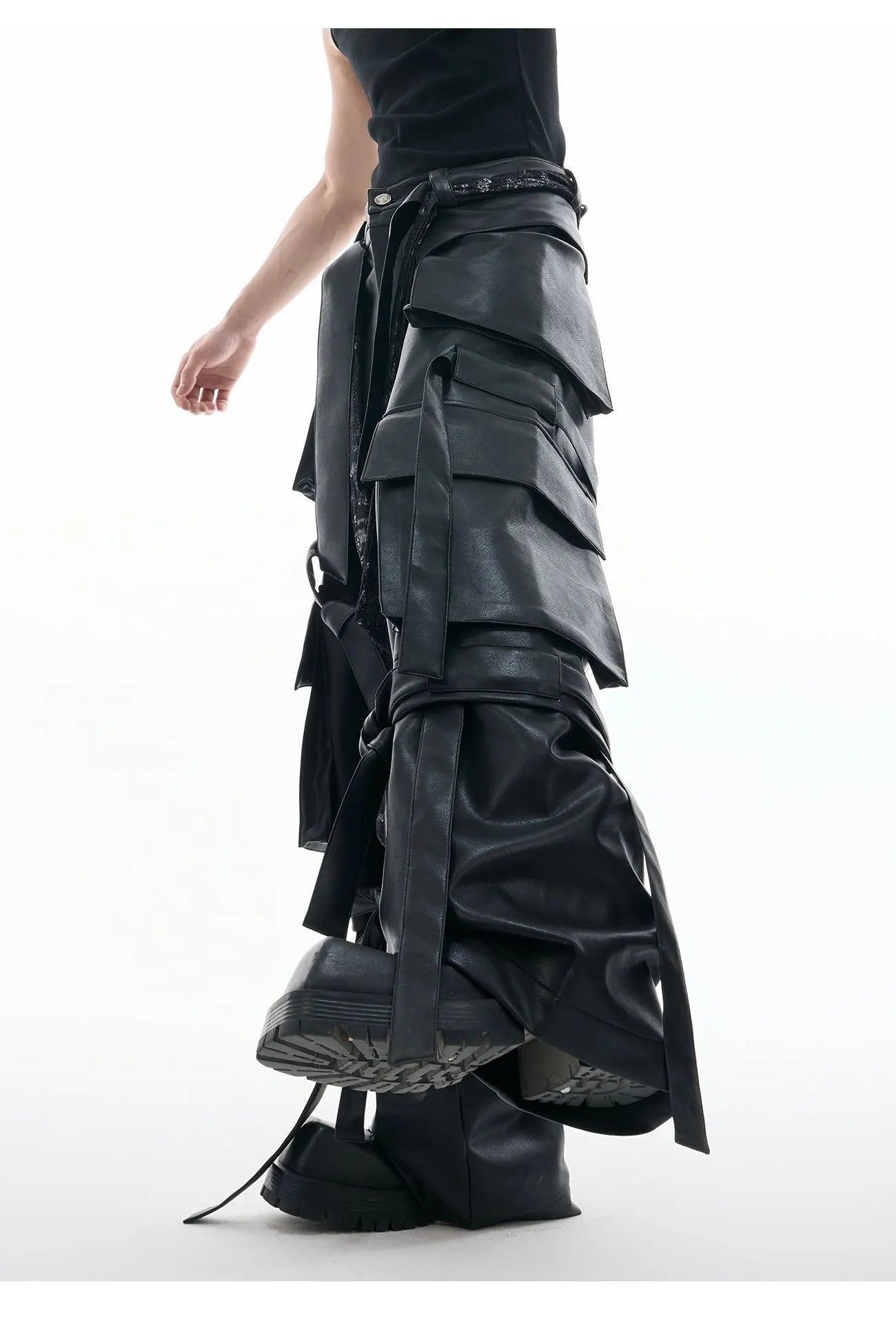Black loose-fit quilted trousers with multiple pockets and retro stitching detail.