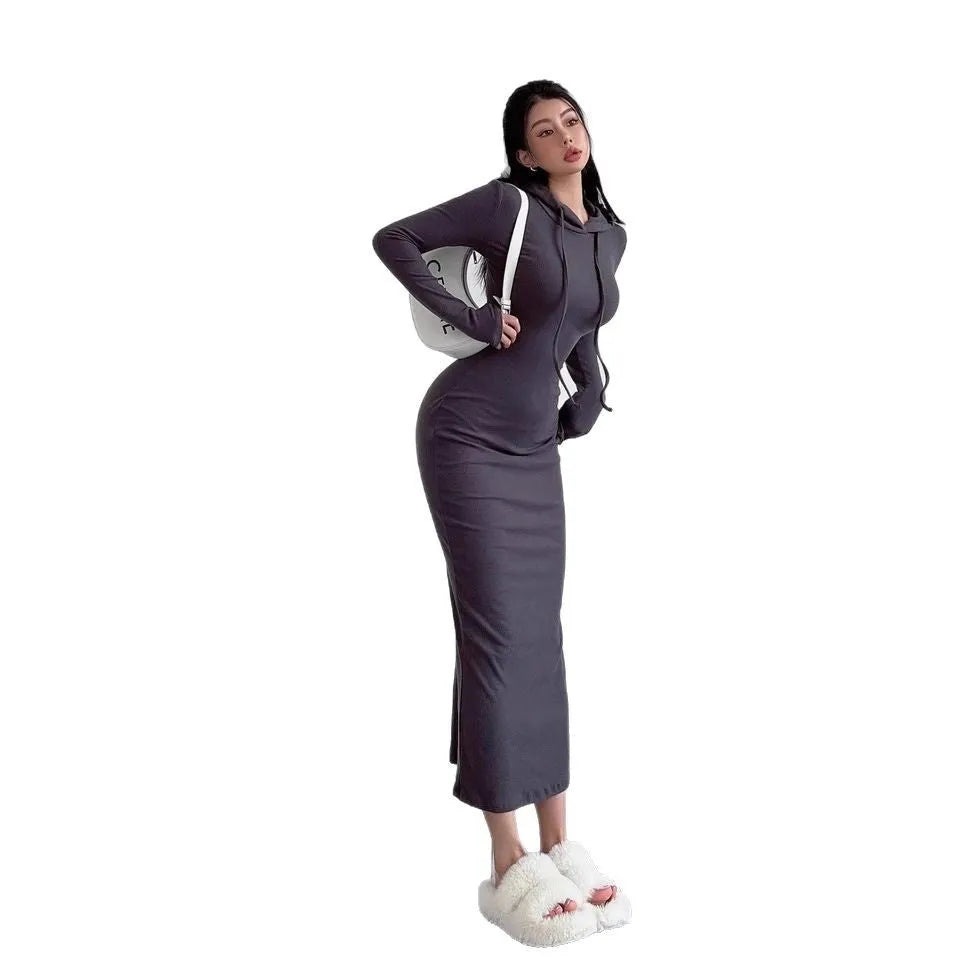 Women's long hooded dress with long sleeves and a sheath silhouette in polyester.