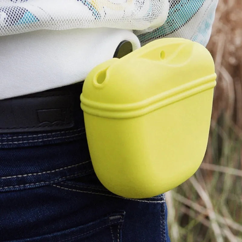 A portable silicone dog treat waist bag with a clip and magnetic opening, shown in available colours.