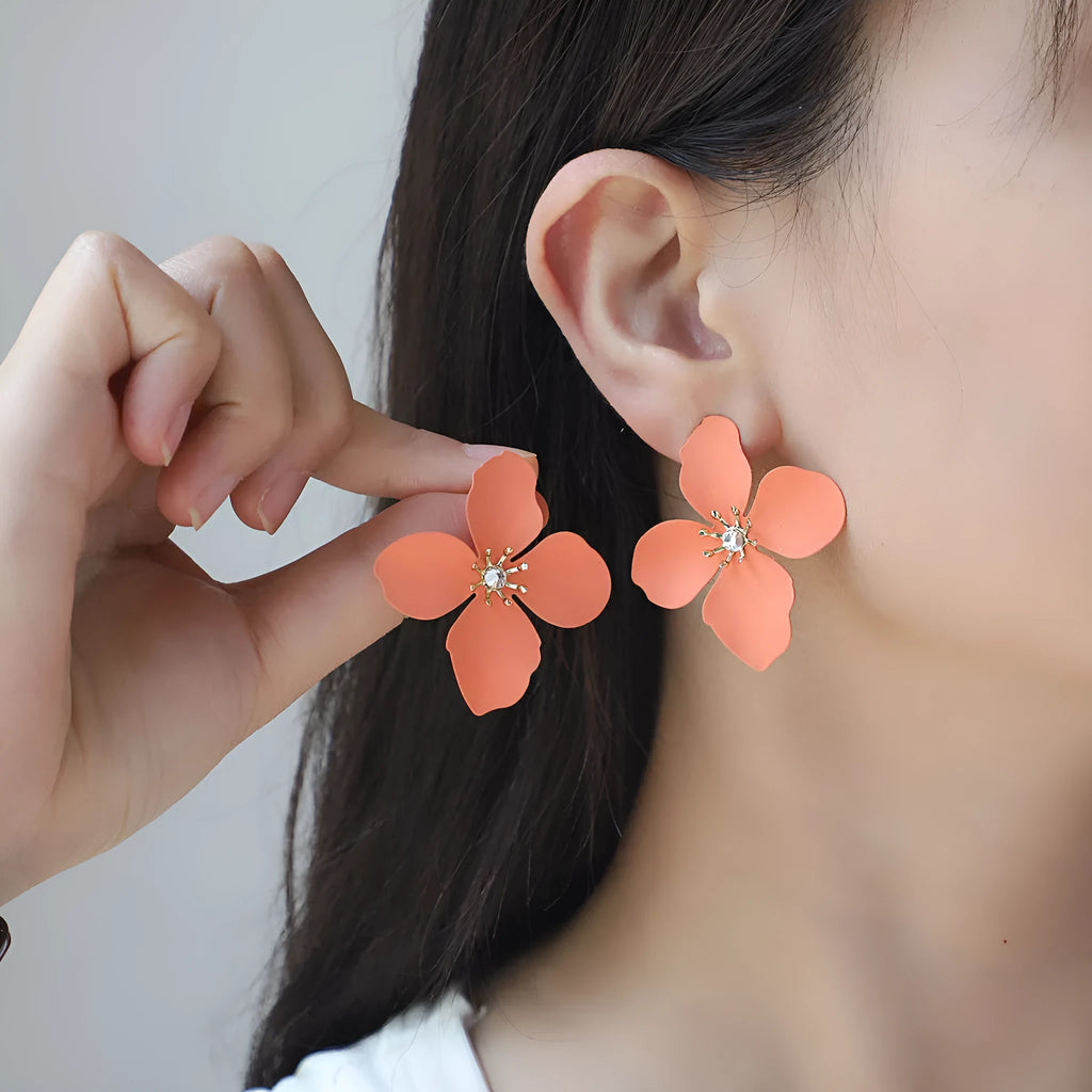 Colourful flower stud earrings made from alloy for women, supplied as one pair in three colour options.