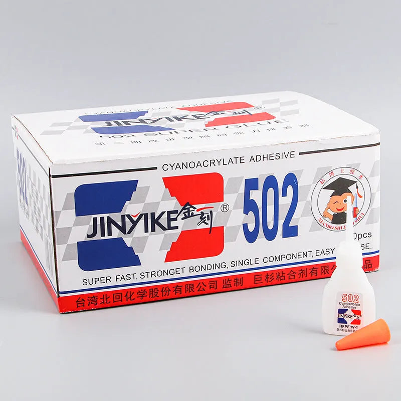 Shoe repair adhesive kit showing a glue tube and a 3x9 cm adhesive patch on a white background.