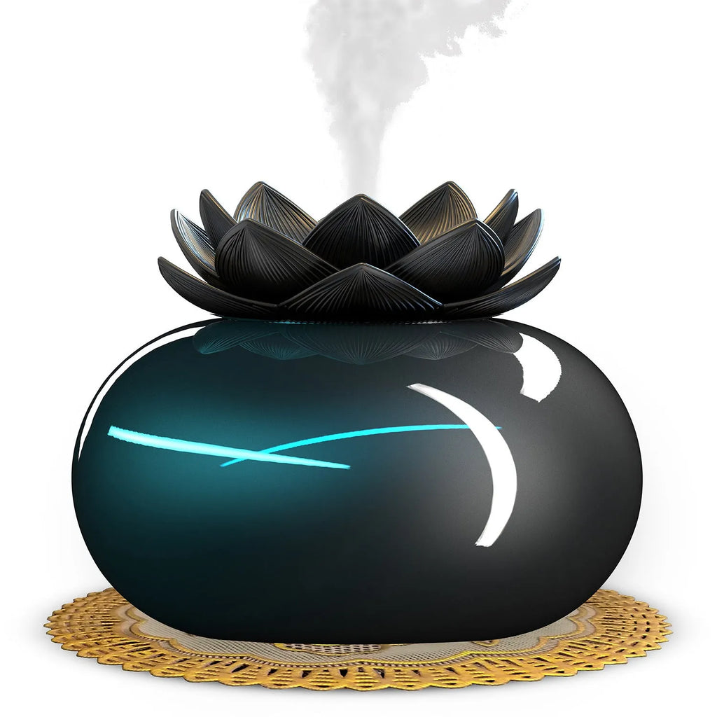Pure black round USB aromatherapy humidifier with ultrasonic mist outlet.