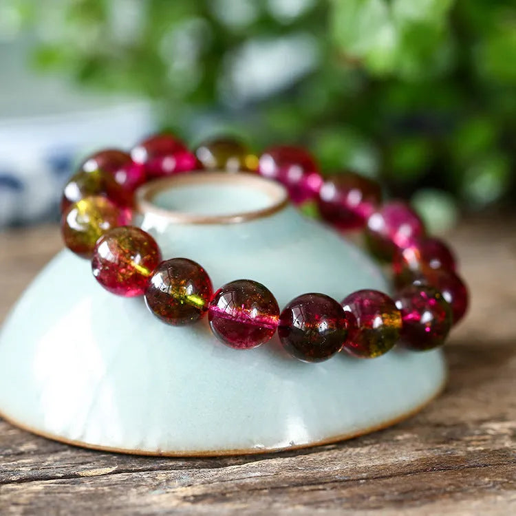 Watermelon crystal bracelet showing crystal beads on wrist, available in 6mm, 8mm, 10mm and 12mm sizes