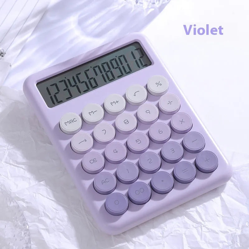 Vibrant gradient colour desktop calculator on a desk, shown in violet, pink, blue and green colour options.
