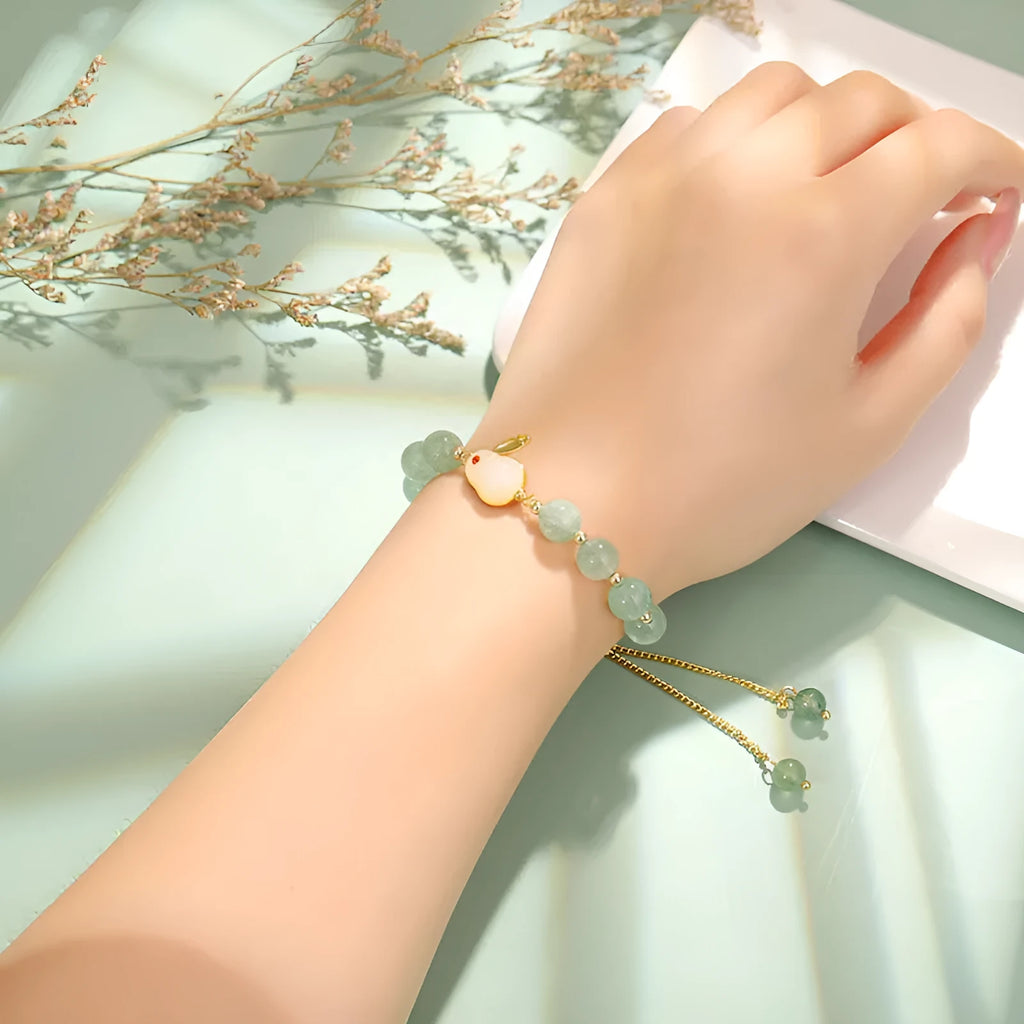 Rabbit bracelet with green aventurine and strawberry quartz beads, copper plating and gold accents