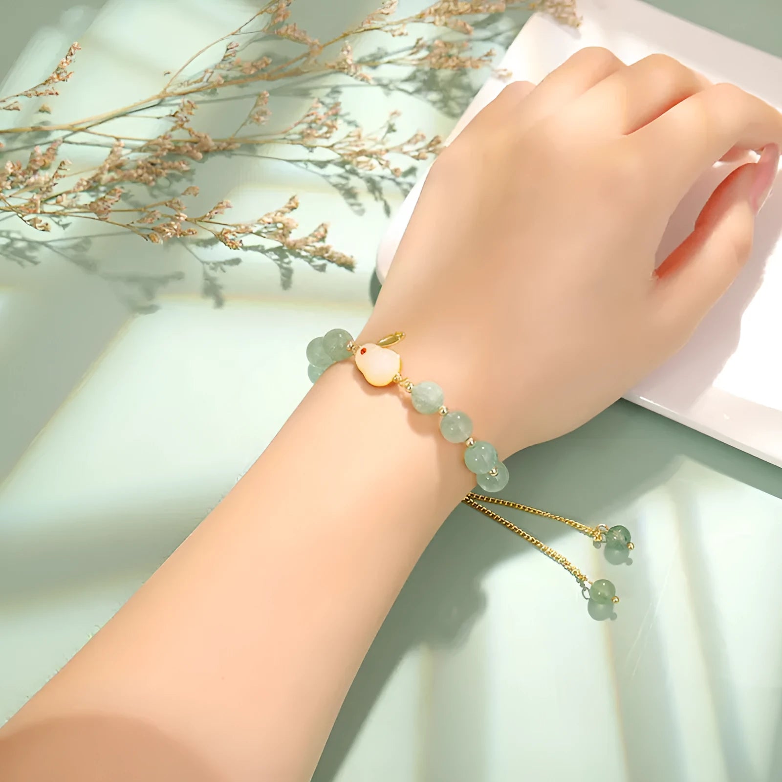 Rabbit bracelet with green aventurine and strawberry quartz beads, copper plating and gold accents