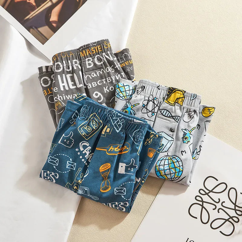 Men's cotton boxer shorts in a patterned design with a mid waistband.