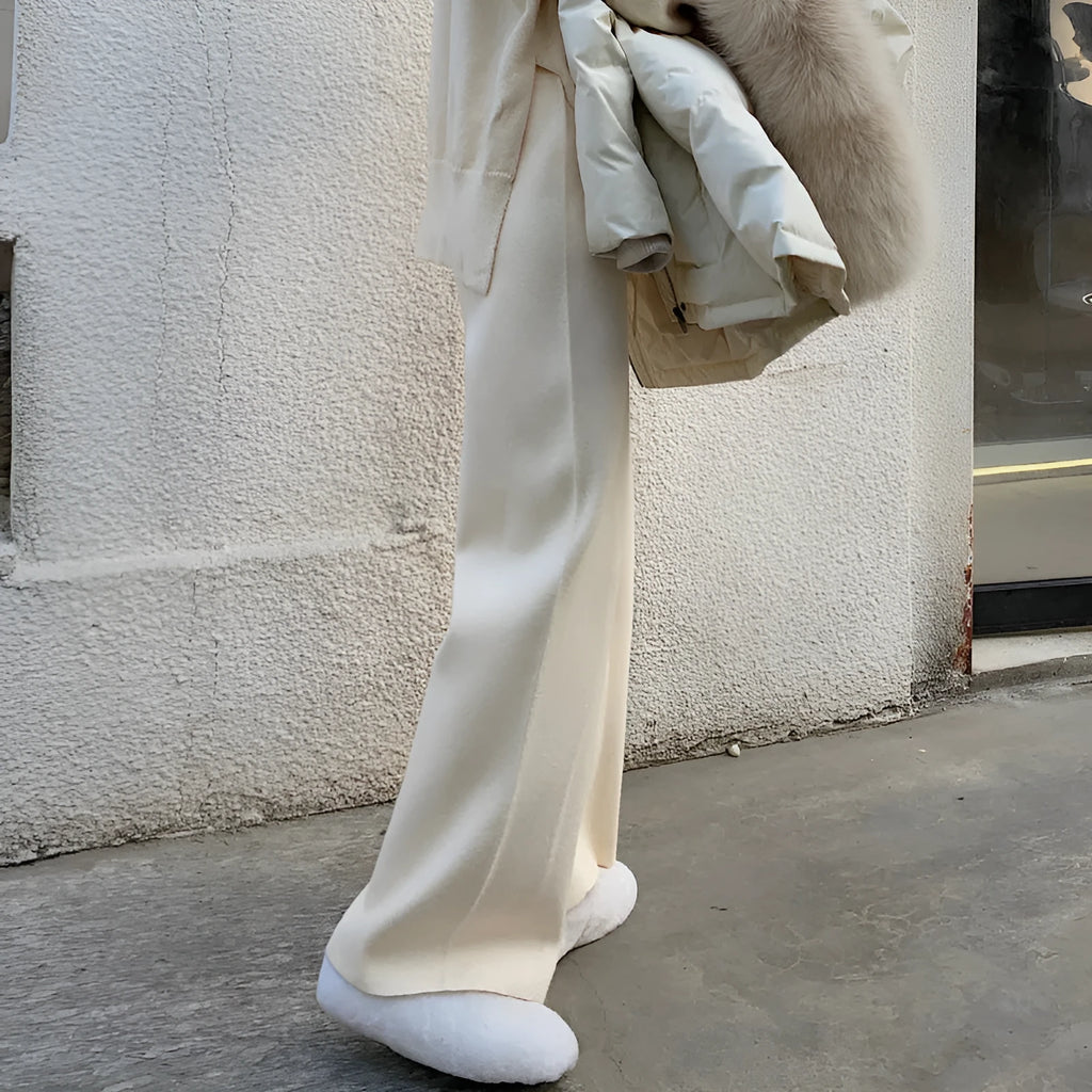 Women's high-waisted wide-leg knitted trousers in cream white, casual autumn winter style.