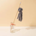 Colourful octopus cat toy with eyes on a long stick for interactive indoor play with kittens and cats