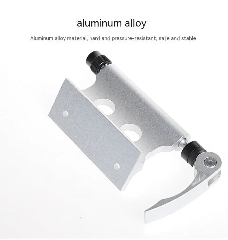 Silver metal quick release fixing clip for bicycle front fork on a white background.