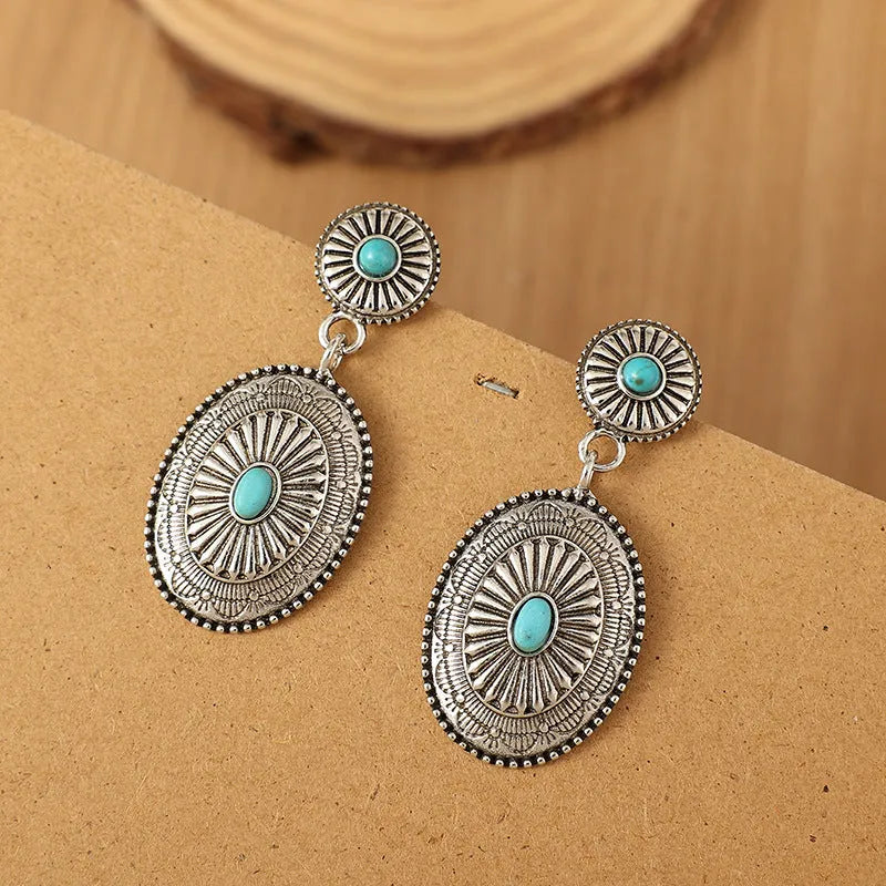 Silver-turquoise alloy drop earrings with retro pumpkin flower design and electroplated finish.