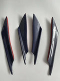 Set of four carbon fibre effect ABS plastic bumper blades for car modification.