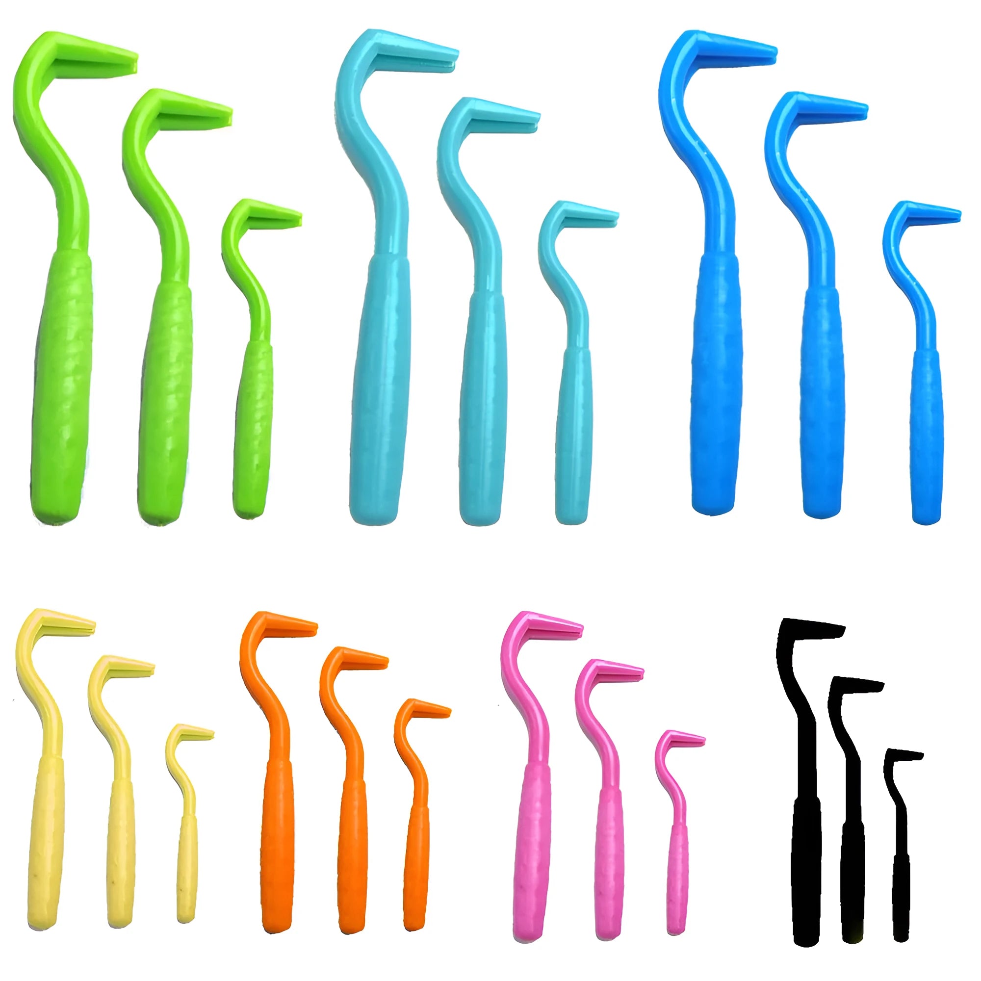 Three tick hook removers for dogs in different colours on white background