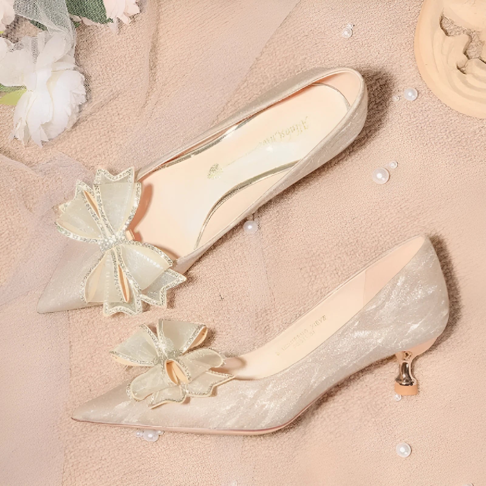 Women's champagne sequin stiletto heel pumps with low top design for wedding occasions