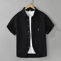 Women's loose lyocell cardigan top in black, green or purple with short sleeves