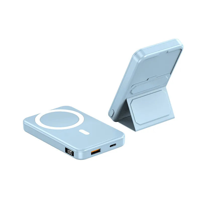 Magnetic wireless charging power bank with folding stand unfolded, shown in navy blue colour.