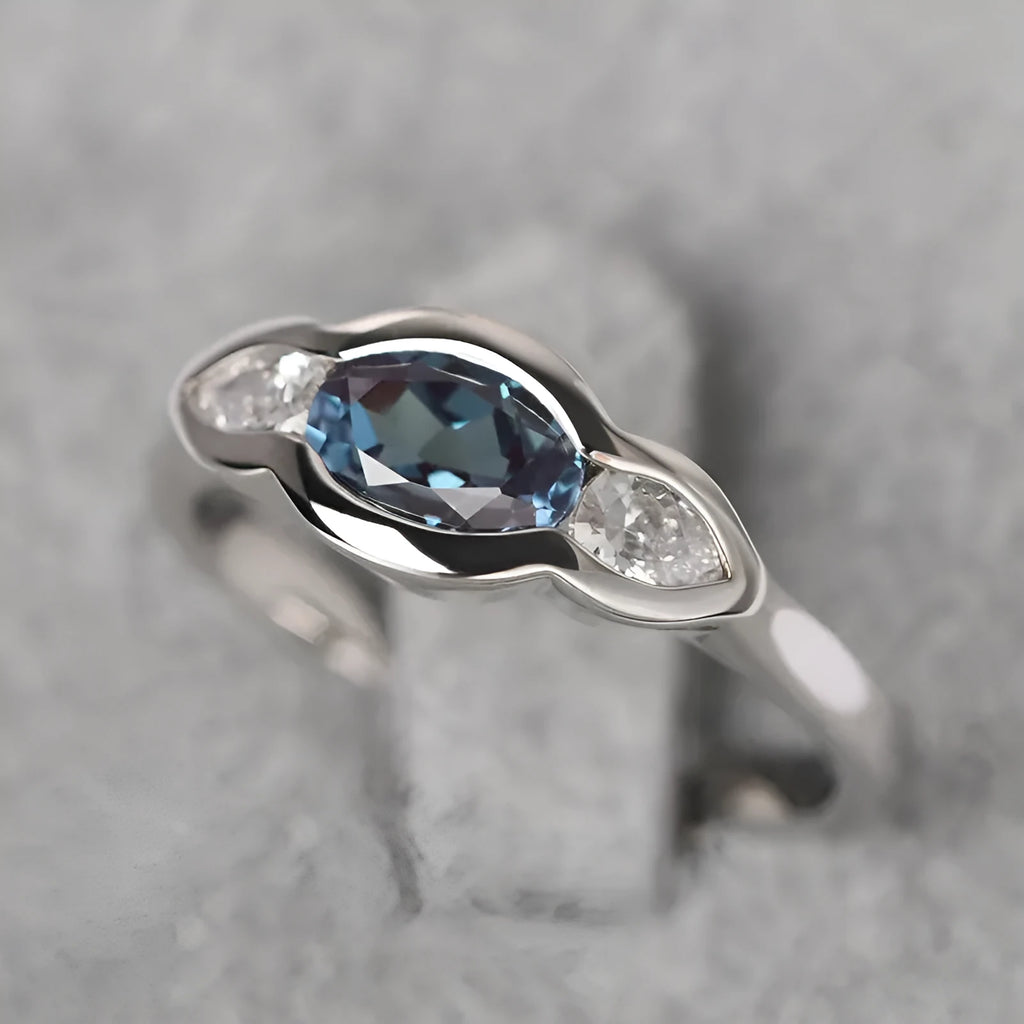 Geometric ellipse copper ring with inlaid zircon stones in white gold colour finish