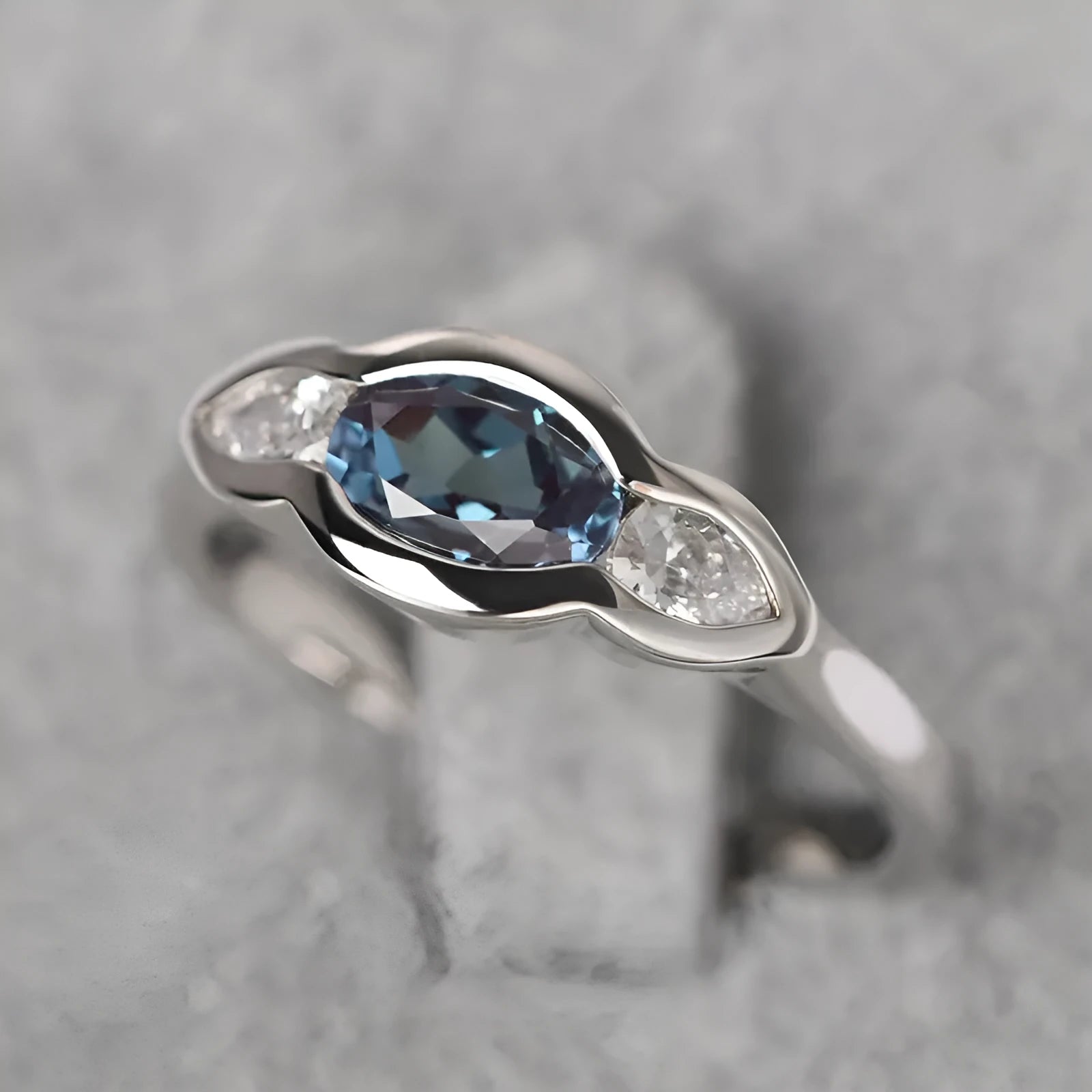 Geometric ellipse copper ring with inlaid zircon stones in white gold colour finish
