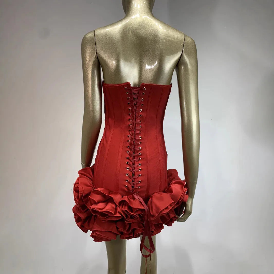 Women's solid colour urban style dress in red, on a model, showing mid-waist fit.