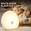 White silicone baby feeding comforter with rechargeable battery and music function