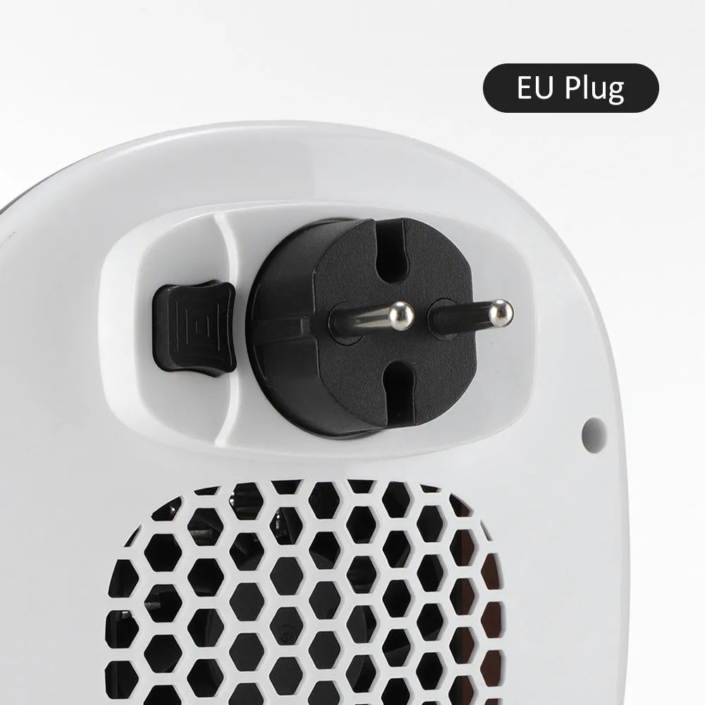 White ceramic heating electric hot air blower with remote control on a table