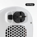 White ceramic heating electric hot air blower with remote control on a table
