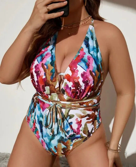 Purple halter neck one-piece swimsuit with bikini style on adult female model
