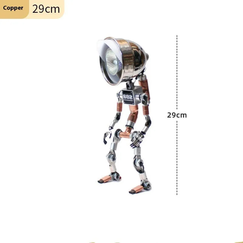 Creative silver or copper robot-shaped decorative desk lamp in 22cm or 29cm size.