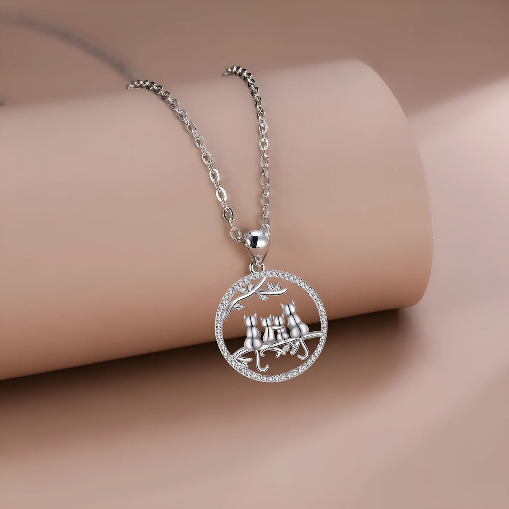 Four kitten pendant necklace on copper cross chain for women