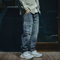 Men's blue loose straight leg jeans with zip fly made from stretch polyester denim fabric