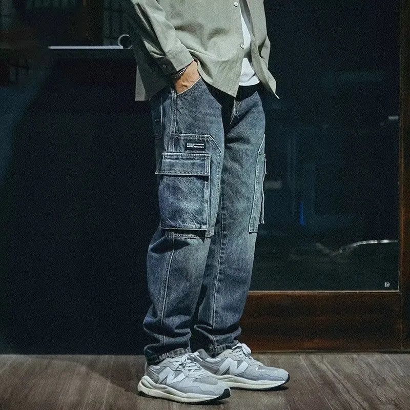 Men's blue loose straight leg jeans with zip fly made from stretch polyester denim fabric