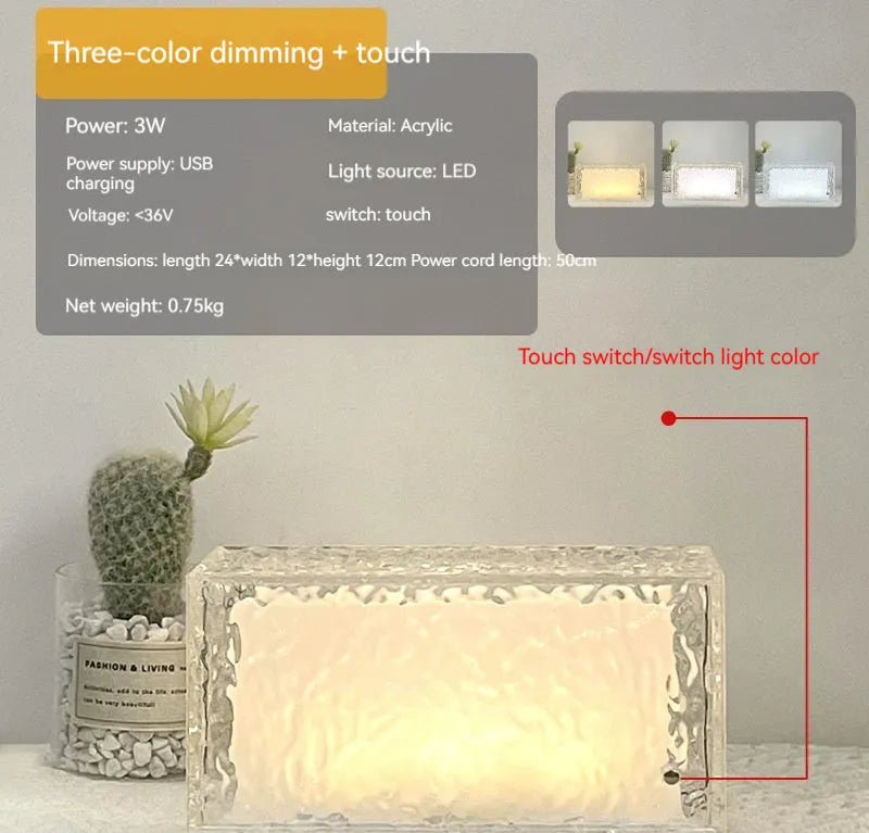 Geometric clear acrylic night light with remote control on a table.