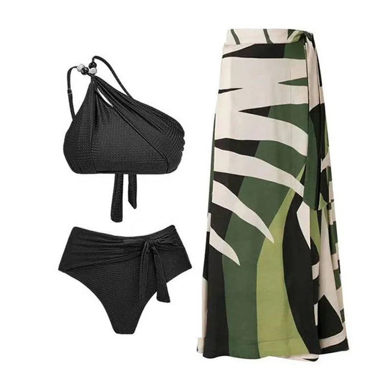 Women's brown push-up high-waist bikini with a matching chiffon skirt cover-up laid flat.