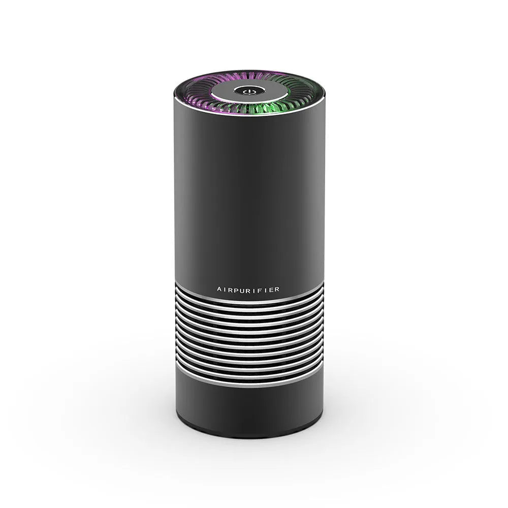 Wireless car air purifier in black, metallic grey, or silver colours, showing compact size for dashboard use.