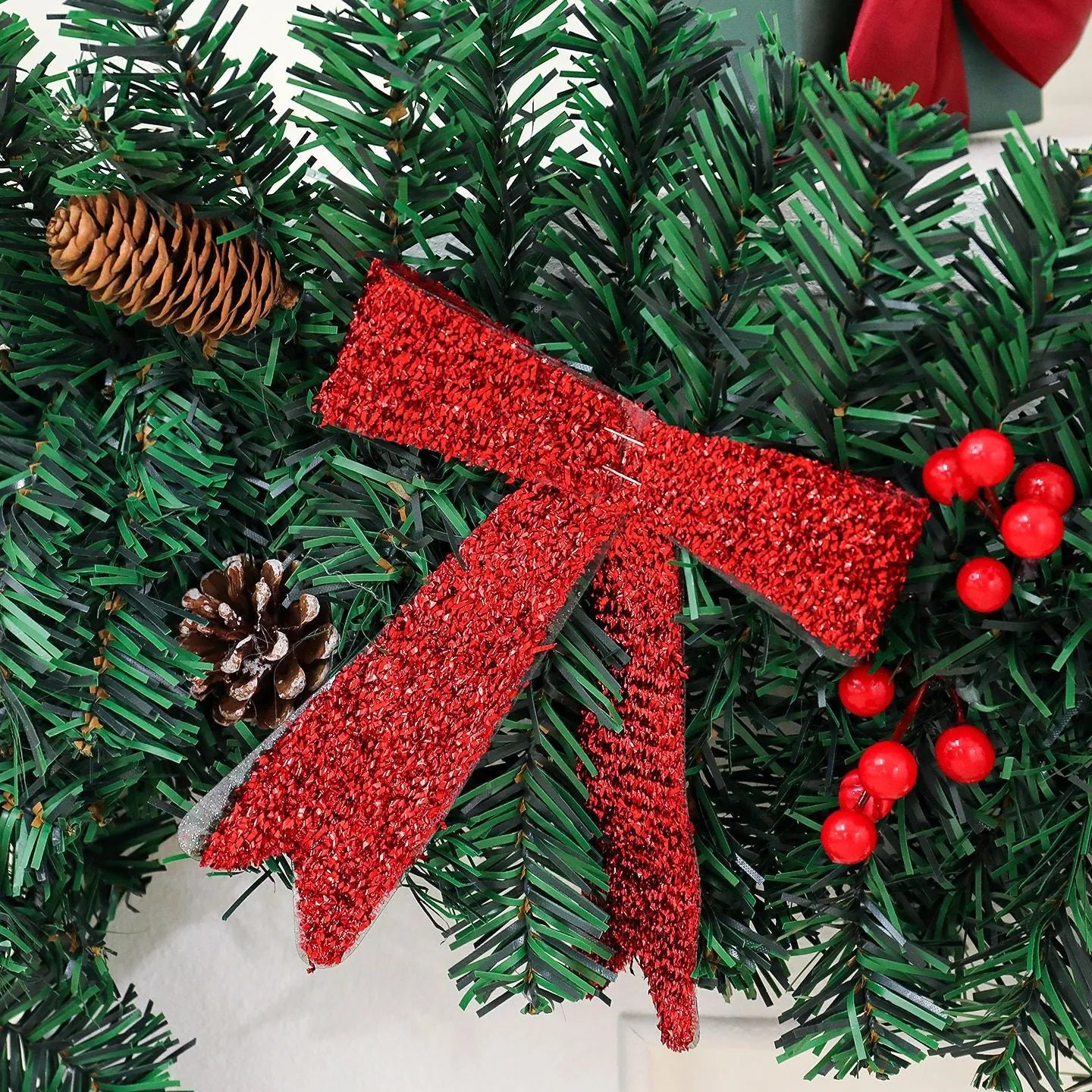 PVC rattan Christmas decorative cane with pine cone and bow design for holiday displays