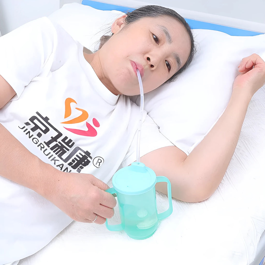 Adult bedside drinking cup with lid and handle, shown in various styles including an oblique mouth choke-proof design.