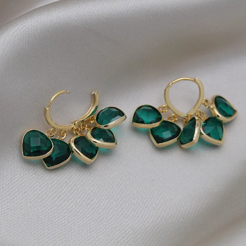 Green glass heart pendant ear clip earrings in Korean style with copper alloy construction