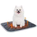 Grey cloth pet cushion shown in a range of four sizes on a wooden floor.