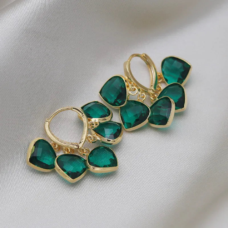 Green glass heart pendant ear clip earrings in Korean style with copper alloy construction