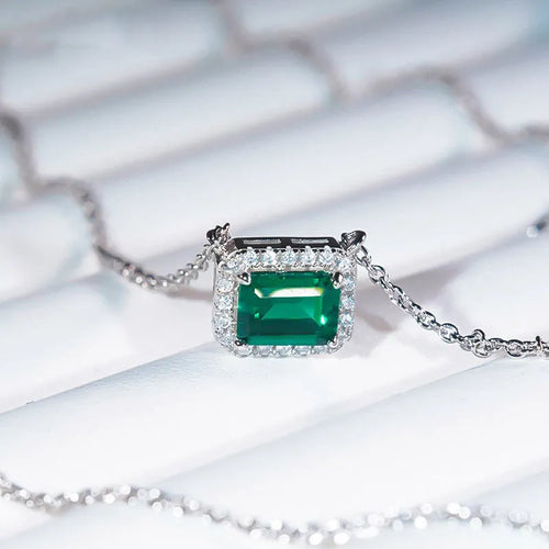 925 sterling silver necklace with green quadrilateral pendant, cross chain style, platinum electroplated finish