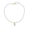 White conch shell bead necklace with a mother-of-pearl pendant on a regular chain.