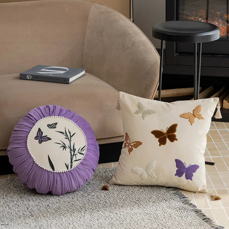 Square beige cushion with intricate Chinese style butterfly embroidery, 45cm in size.